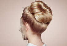 Explore the Hottest Beehive Hairstyles, Buzzing with Style High-fashion model wearing a retro 1960s bouffant and towering beehive hairstyle.