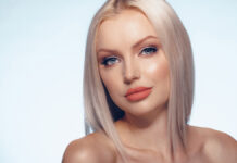 Why Box Bob Hairstyles Are the Next Big Hair Trend Woman with a chic, chin-length blunt box bob hairstyle and bouncy internal texture.