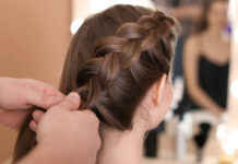 How to Style Long Hair for Work: Expert Tips for a Polished Look Professional woman with an elegant and polished long hairstyle perfect for the office.