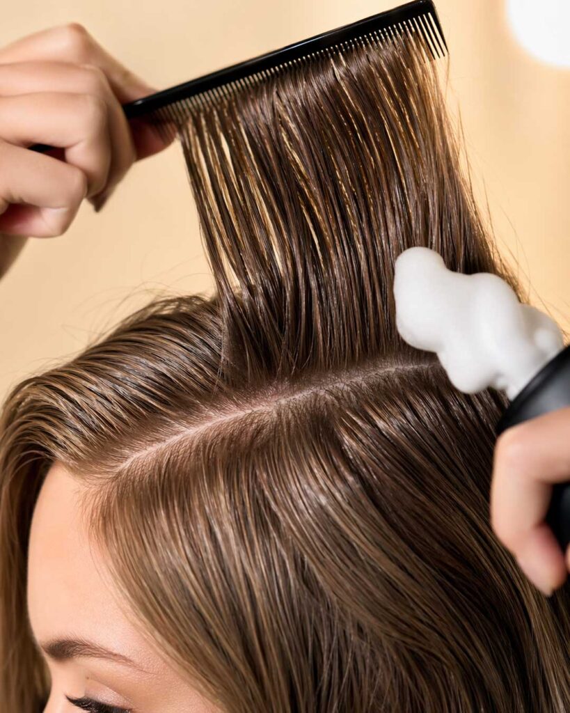 Close-up of root lift and styling products for round faces.